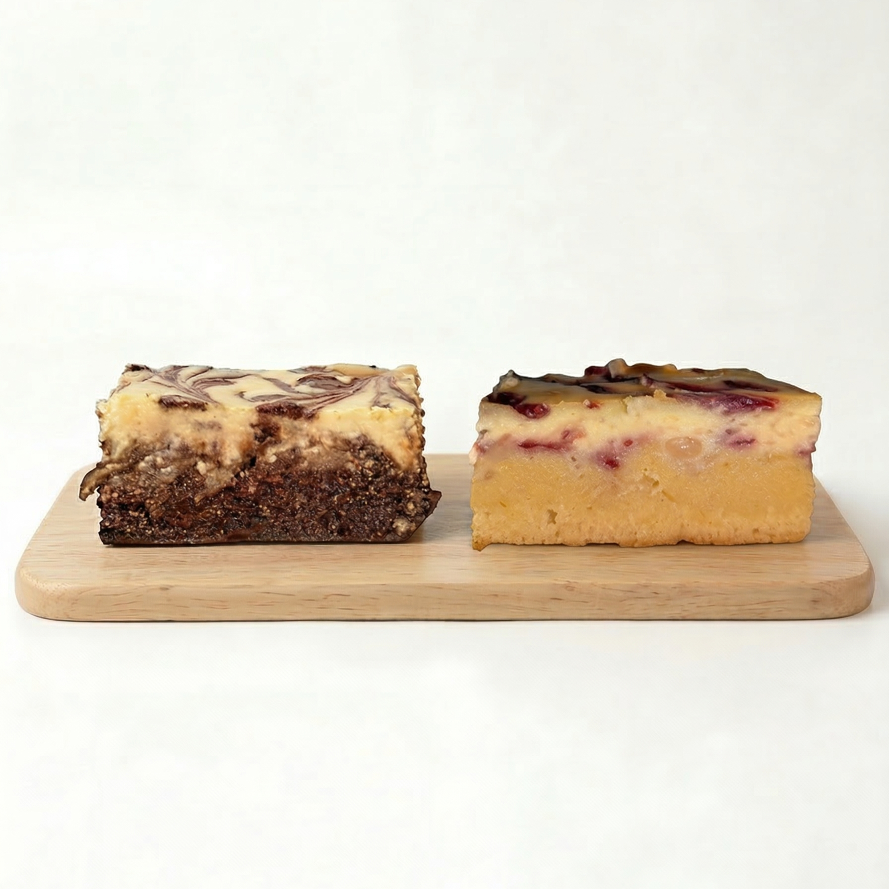 Packs 4 Brownies Mix: 2 brownies con cheesecake de chocolate blanco y 2 blondies o con cheesecake y frambuesa. - Pastelería Butterfly